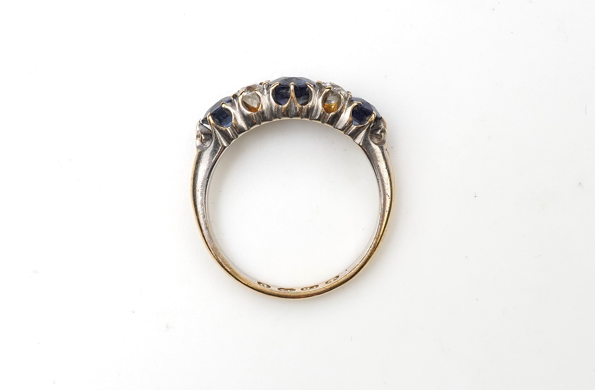 A Victorian sapphire and diamond ring, circa 1889